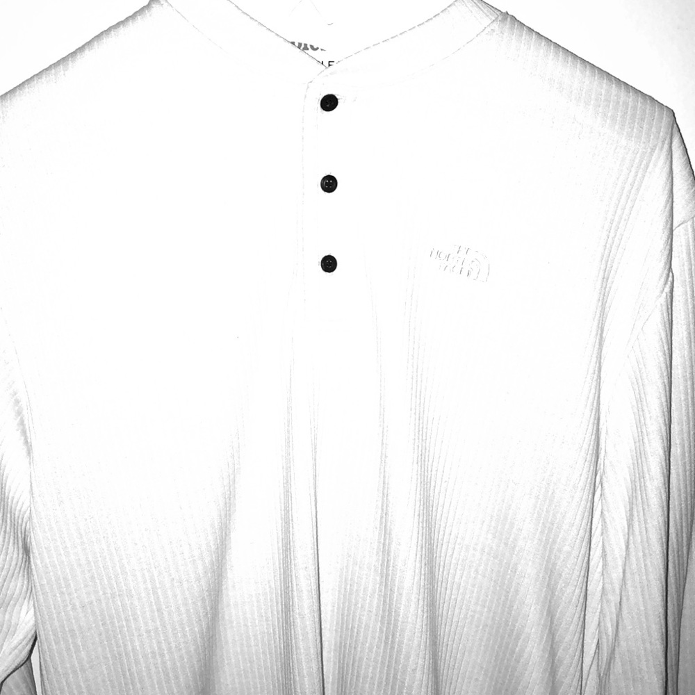 Long sleeve quarter button white shirt.